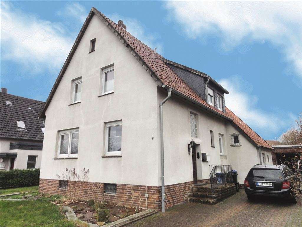 1 - 2 Familienhaus mit Garage und großen Grundstück