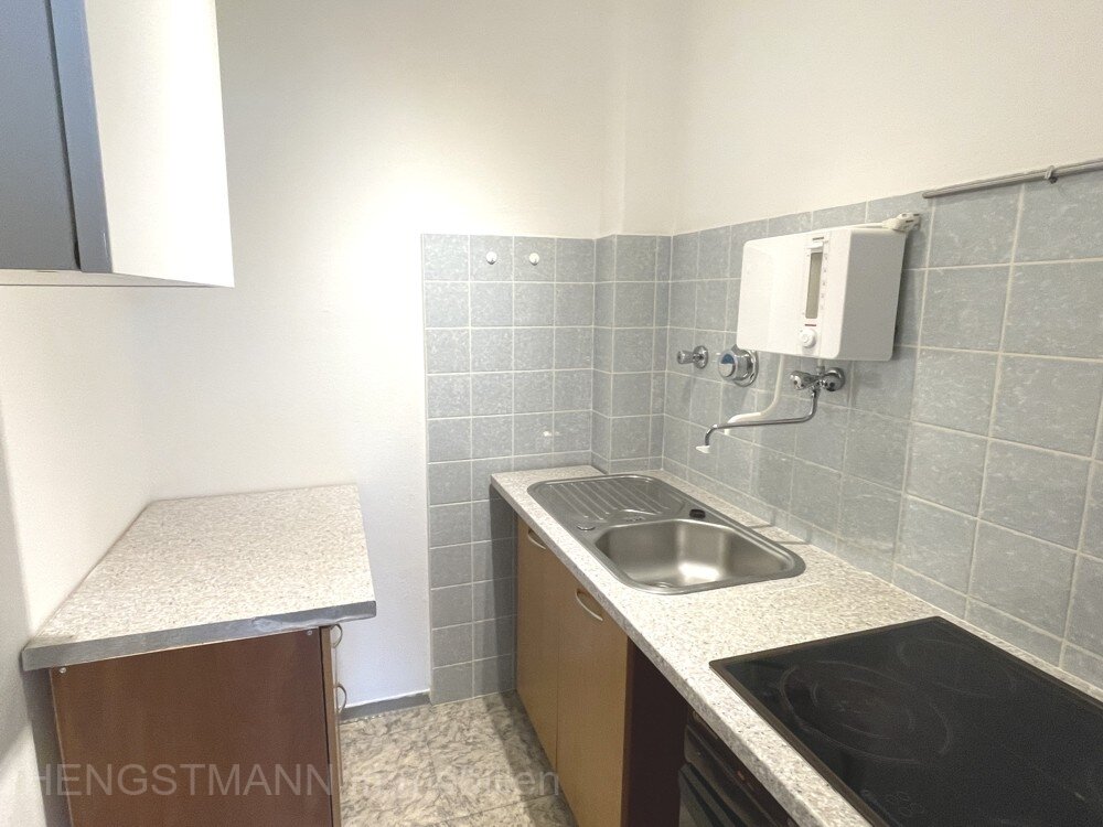 2-Zimmer-Eigentumswohnung in modernisiertem Mehrfamilienhaus mit Balkon in ruhiger Ortsrandlage