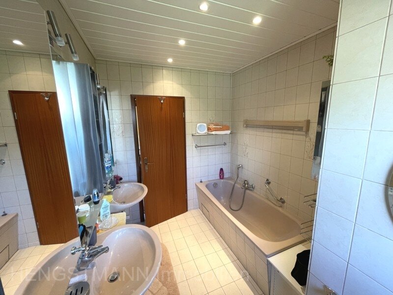 Einfamilienhaus in wärmegedämmter Holzständerbauweise mit Klinkerfassade und Garage in ruhiger Lage