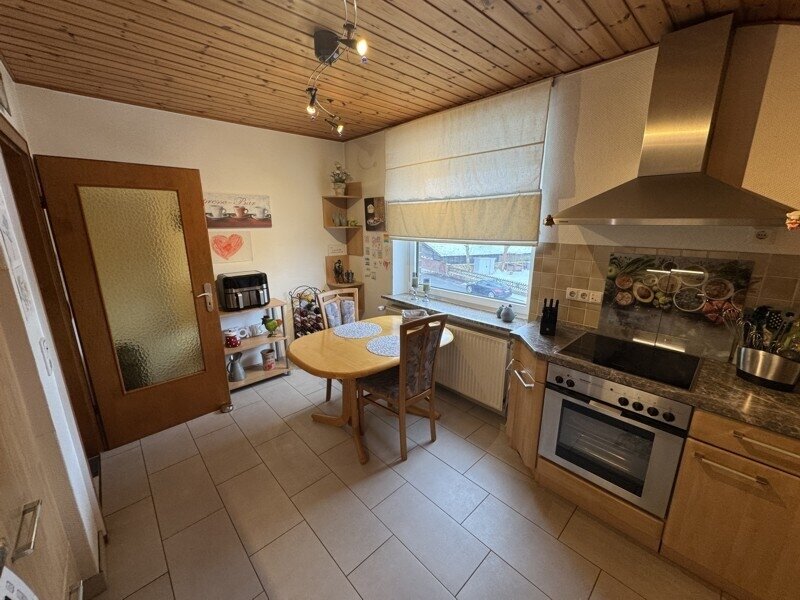 4-Zi--ETW im Grünen mit Gartenanteil, Balkon, Garage und DG als Ausbaureserve  