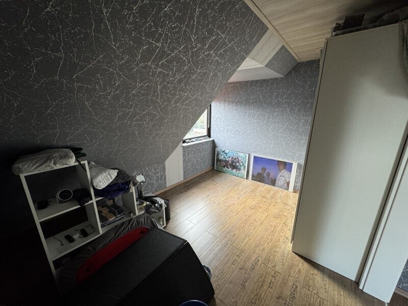 1 bis 2-Familien-Doppelhaushälfte mit zusätzlichem Büro oder Ladenraum im Souterrain und Doppelgarage